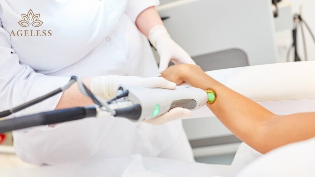 A dermatologist performing laser hair removal on a patient's leg